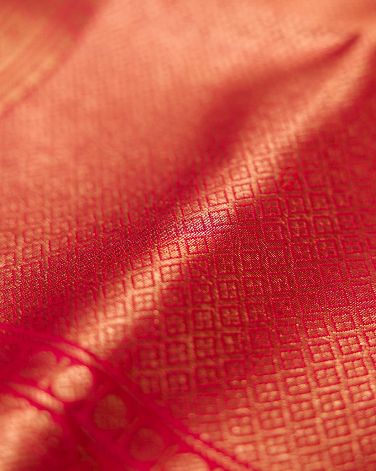 Pure kanjivaram in red with green Kora and Maggam work blouse