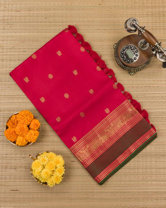 Pure kanjivaram in red with green Kora and Maggam work blouse