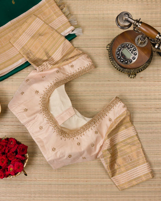 Emerald Green Koravai Kanjivaram with Pastel Border & Maggam Blouse