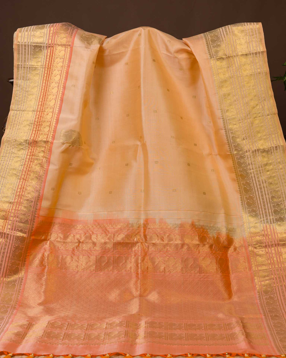 Pure kanjivaram in unique shade of peachish orange