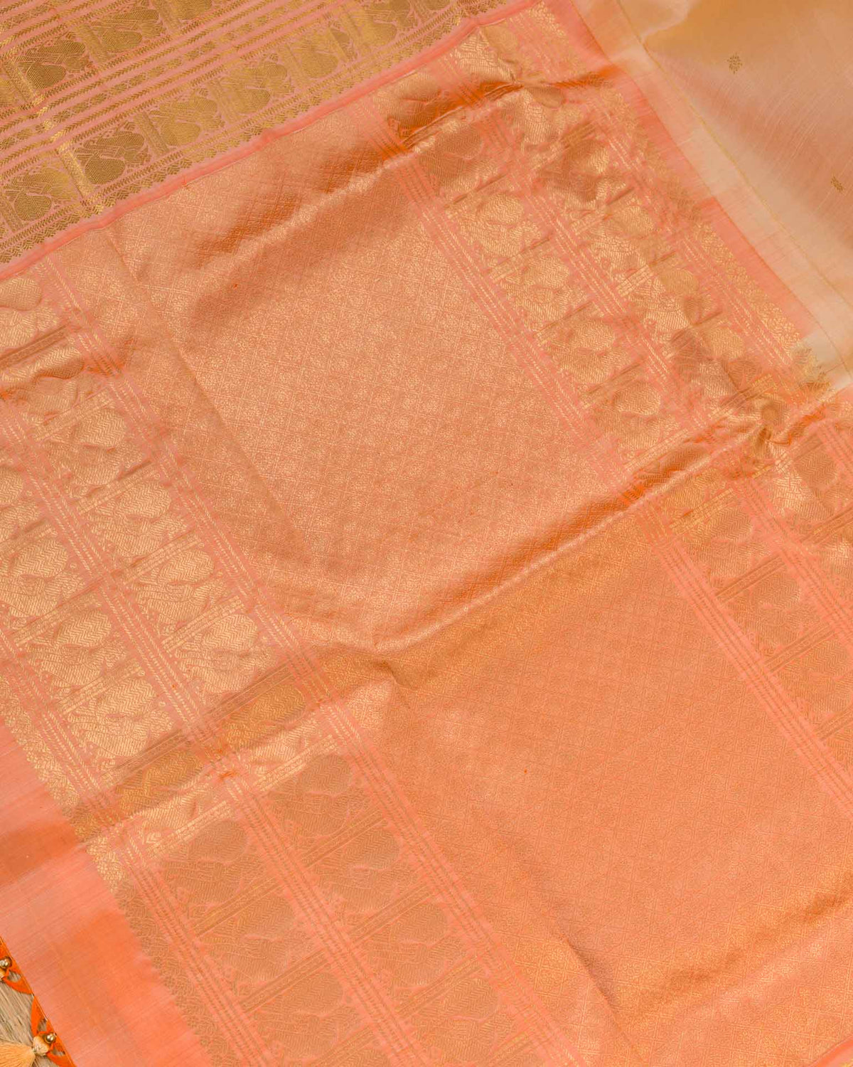 Pure kanjivaram in unique shade of peachish orange