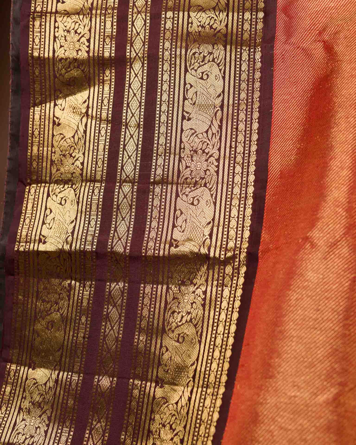 Pure Kanjivaram in rust orange and brown with twill weave