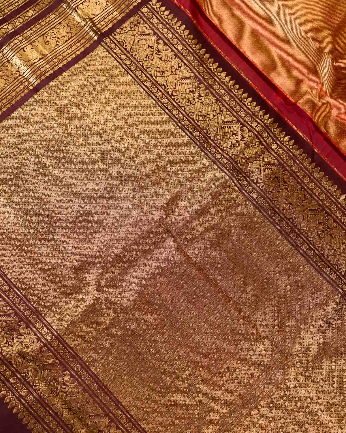 Pure Kanjivaram in rust orange and brown with twill weave