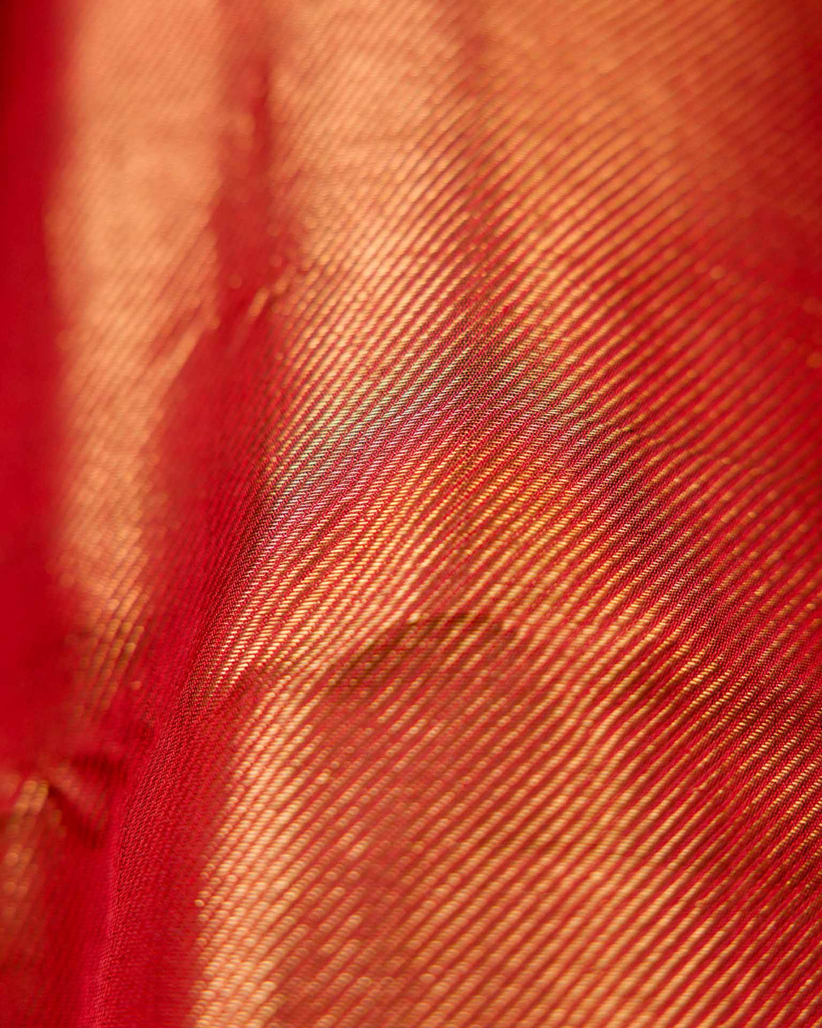 Pure Kanjivaram in rust orange and brown with twill weave