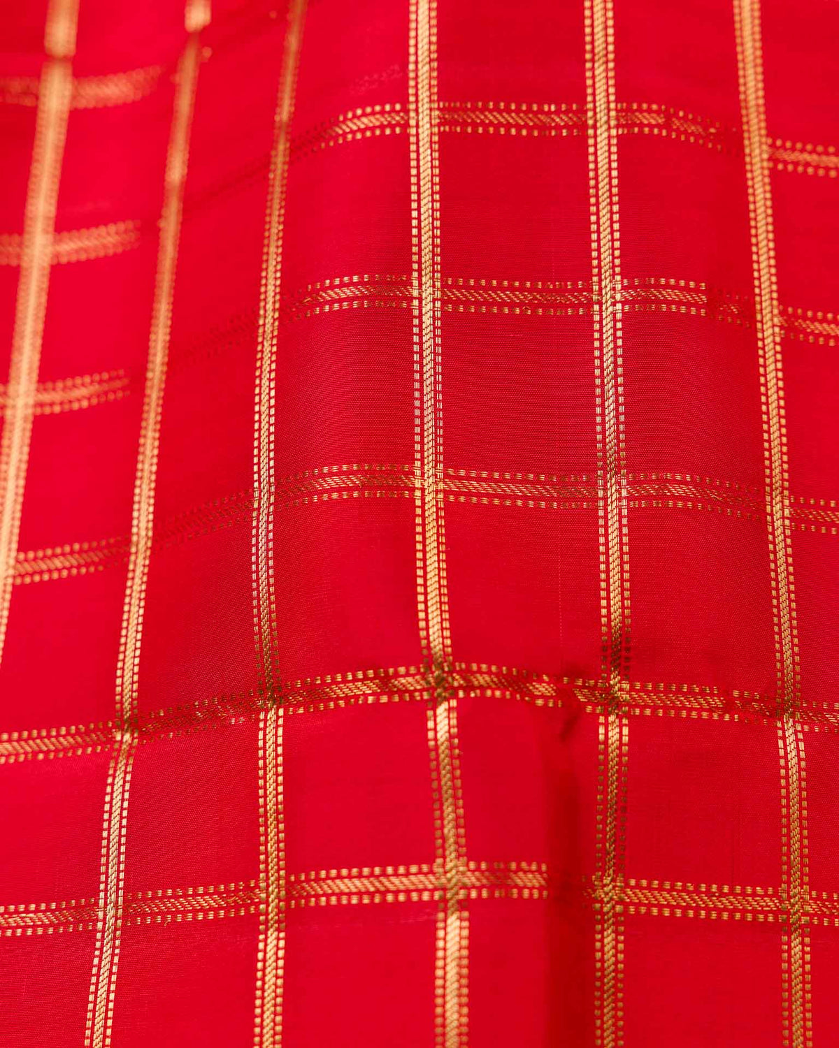 Pure kanjivaram in bright red with Maggam work blouse