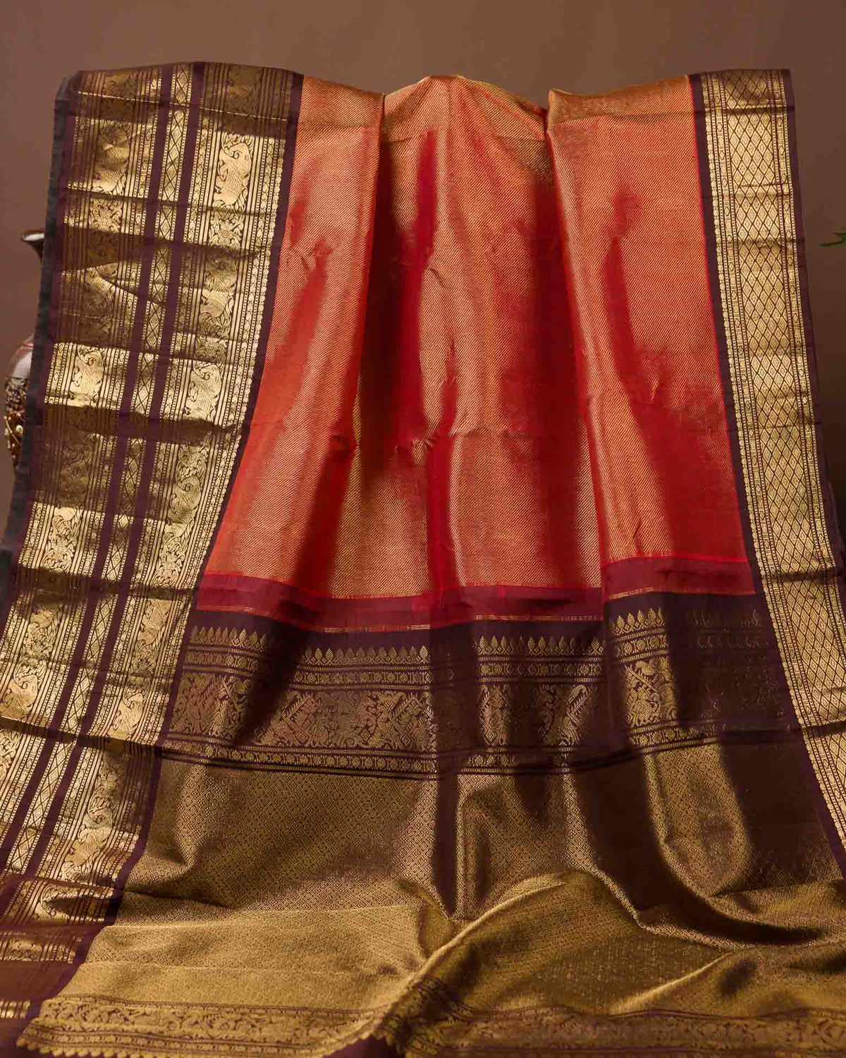 Pure Kanjivaram in rust orange and brown with twill weave