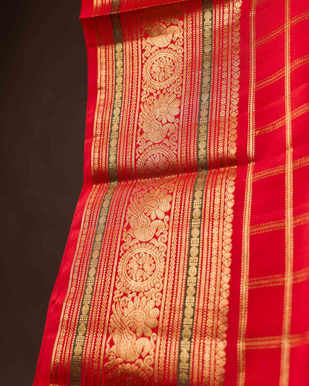 Pure kanjivaram in bright red with Maggam work blouse