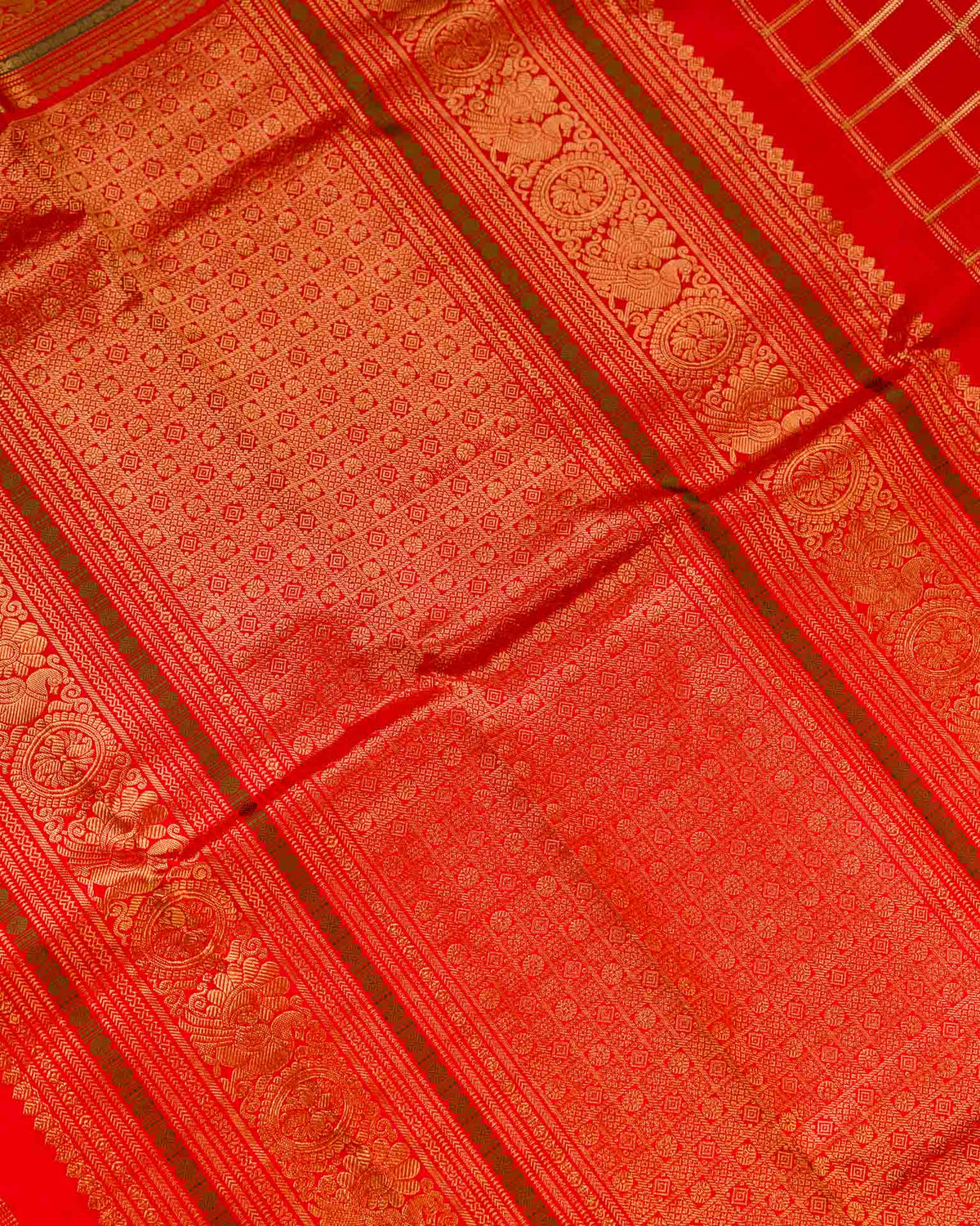 Pure kanjivaram in bright red with Maggam work blouse
