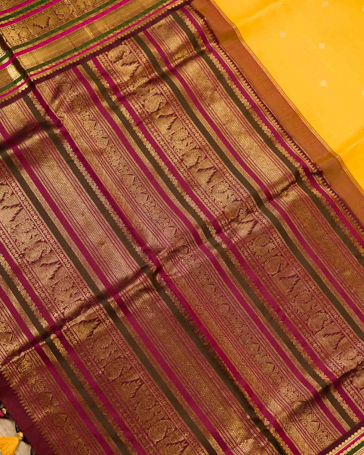 Pure korvai kanjivaram in yellow and maroon red
