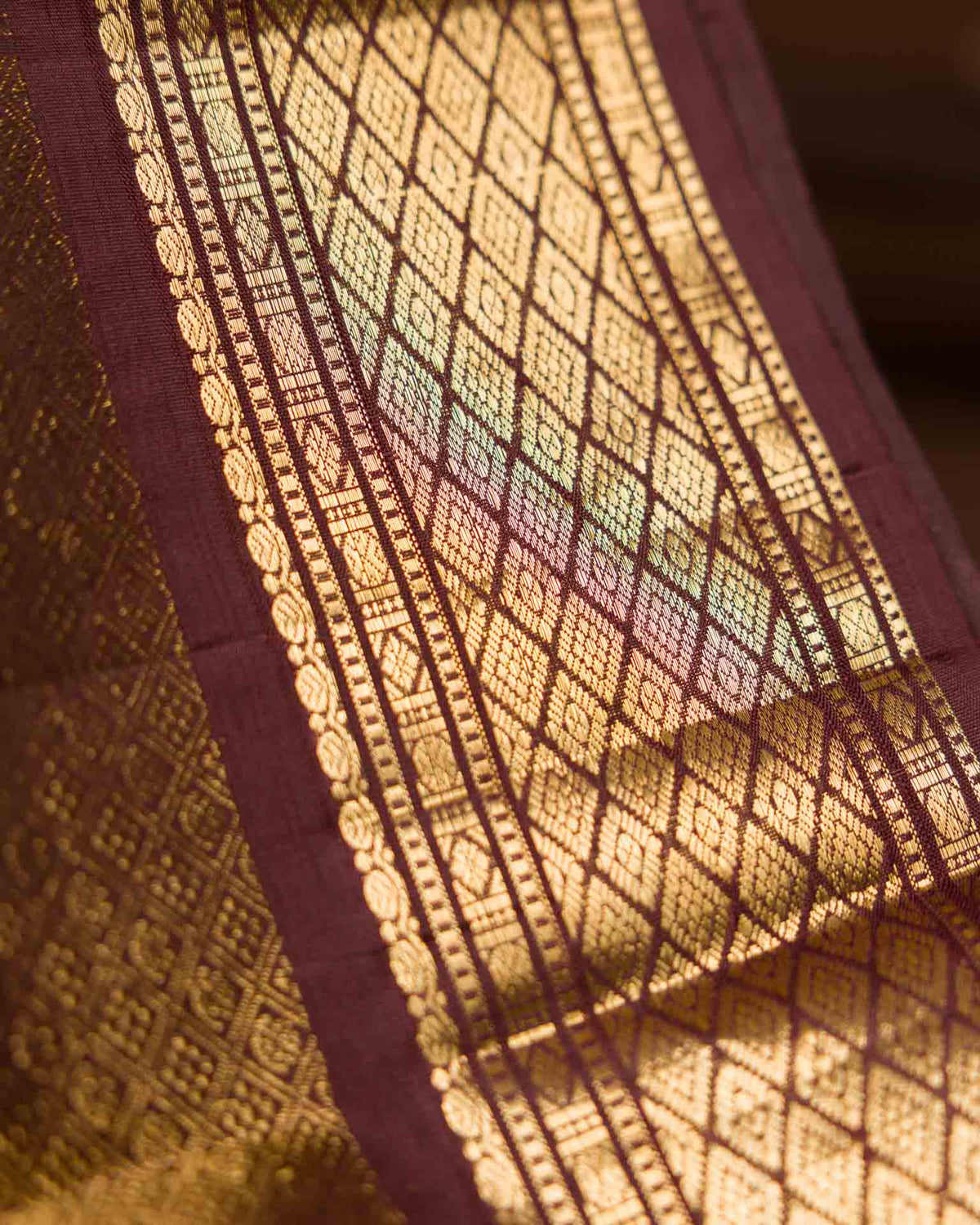 Pure Kanjivaram in rust orange and brown with twill weave