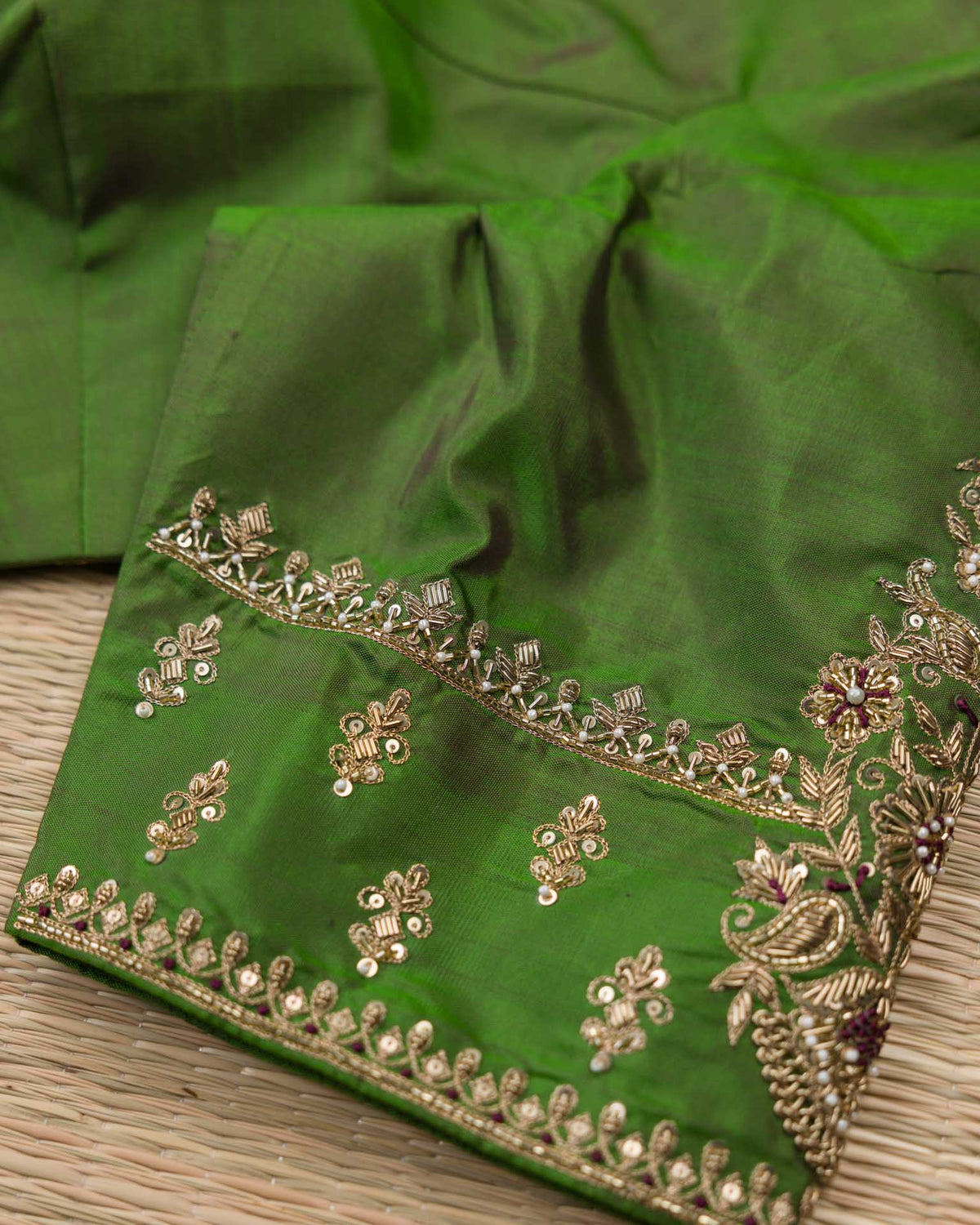 Pure kanjivaram with all over weave paired with Maggam work blouse