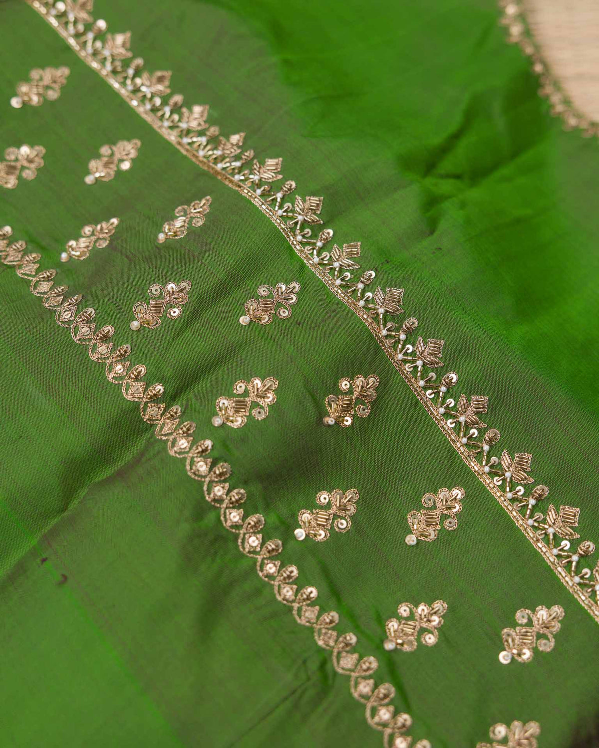 Pure kanjivaram with all over weave paired with Maggam work blouse
