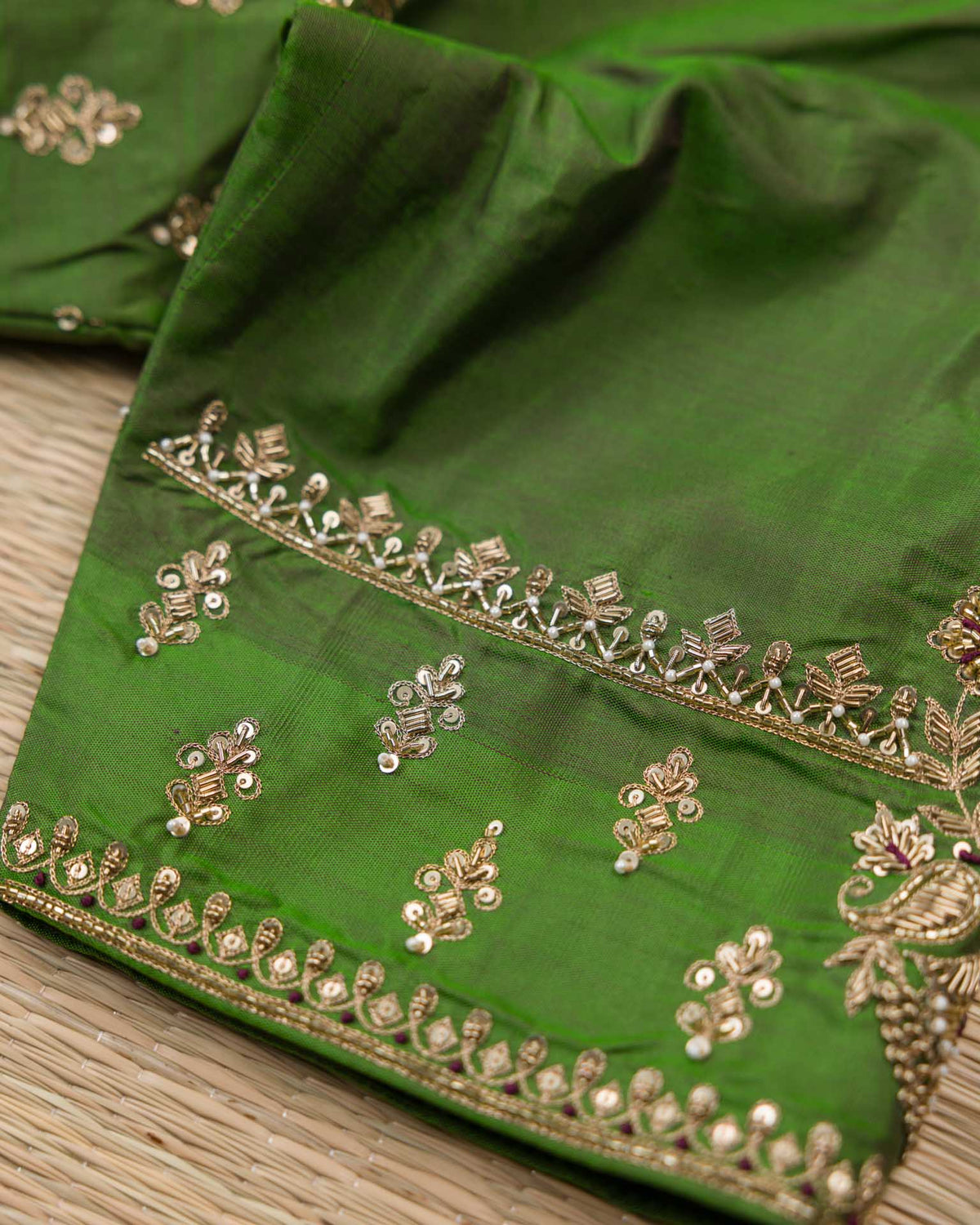 Pure kanjivaram with all over weave paired with Maggam work blouse