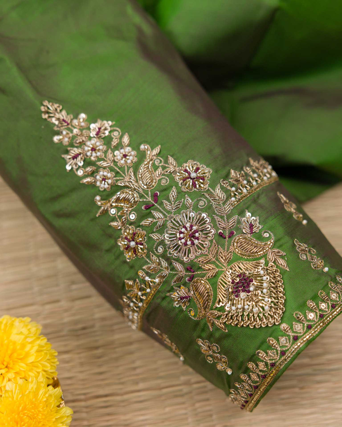 Pure kanjivaram with all over weave paired with Maggam work blouse