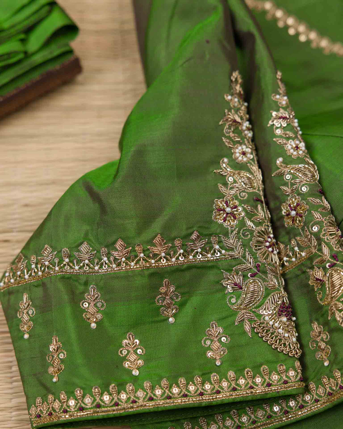 Pure kanjivaram with all over weave paired with Maggam work blouse