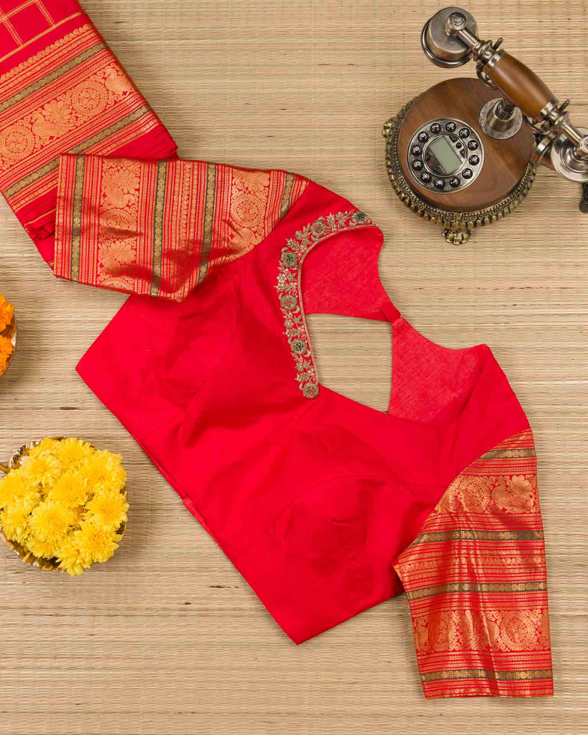 Pure kanjivaram in bright red with Maggam work blouse