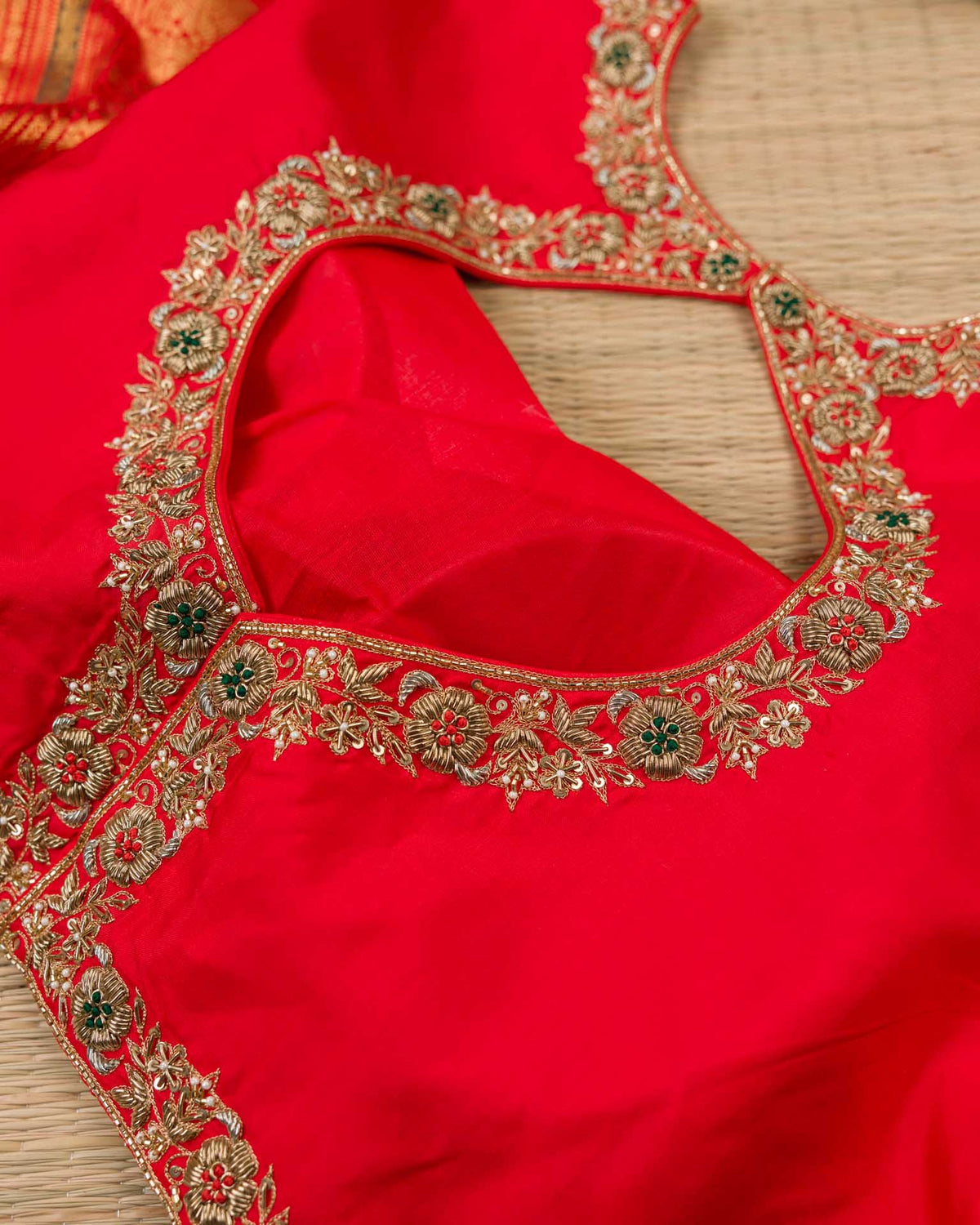 Pure kanjivaram in bright red with Maggam work blouse