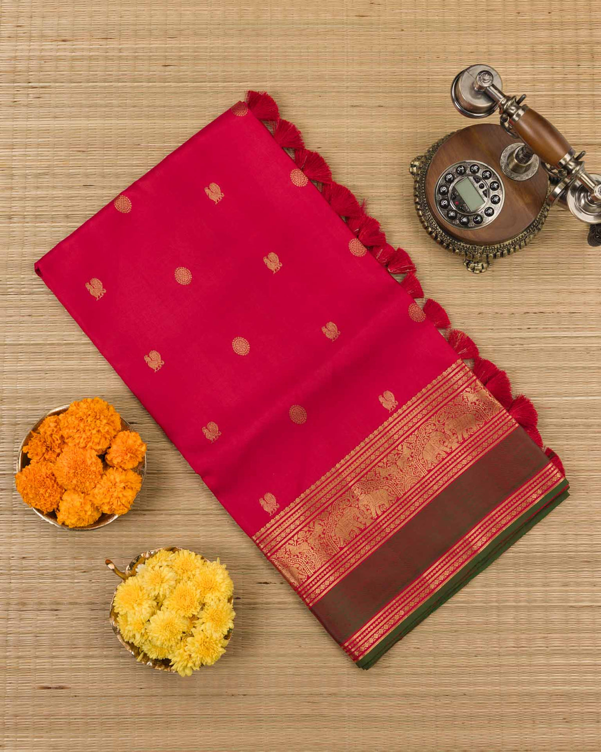 Pure kanjivaram in red with green Kora and Maggam work blouse