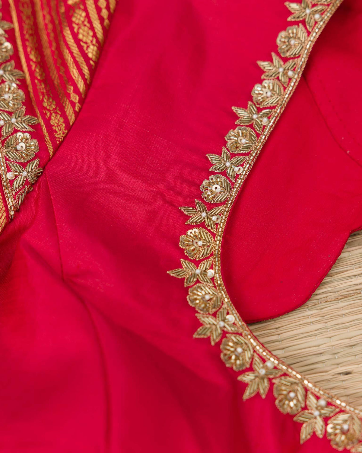 Pure kanjivaram in red with green Kora and Maggam work blouse