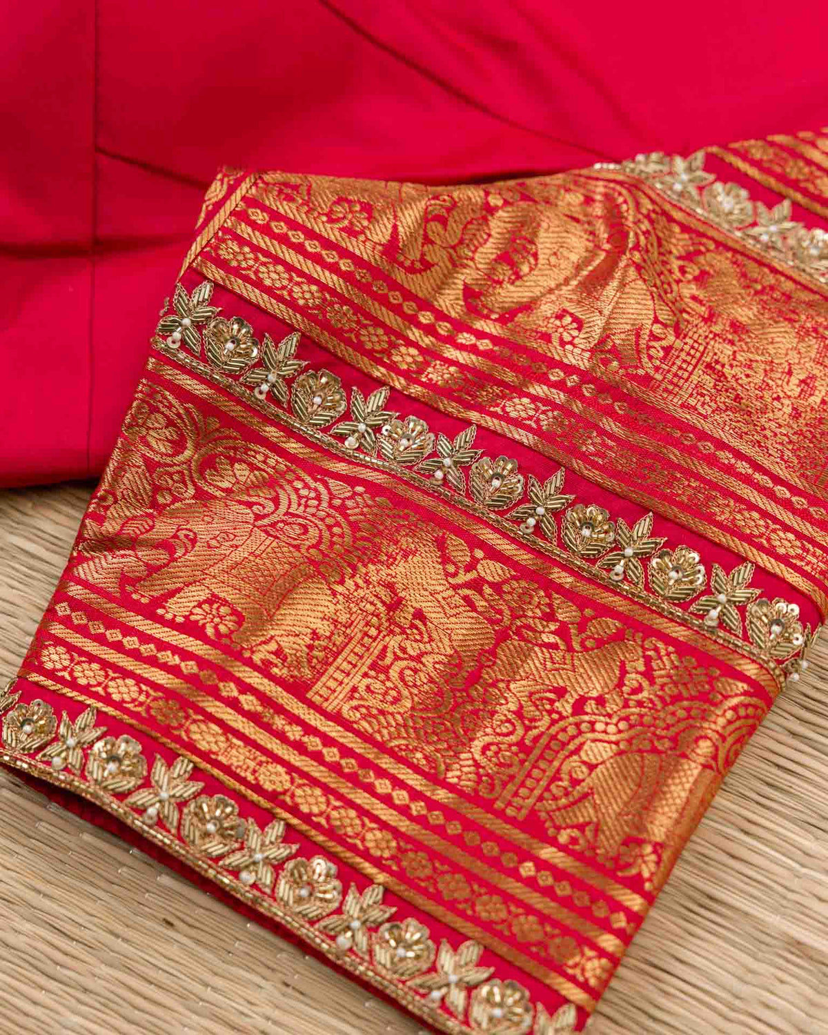 Pure kanjivaram in red with green Kora and Maggam work blouse
