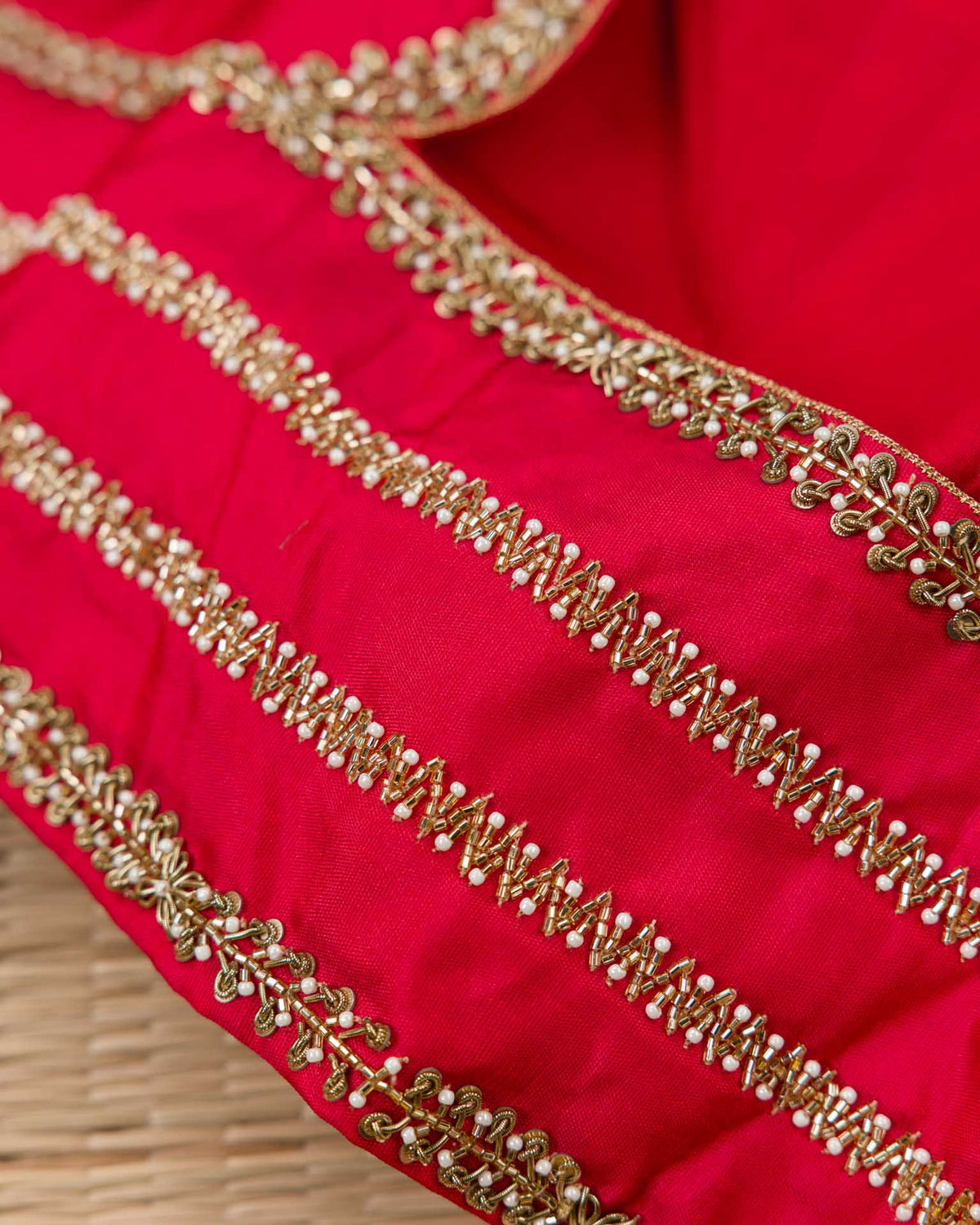 Pure kanjivaram in red with green Kora and Maggam work blouse