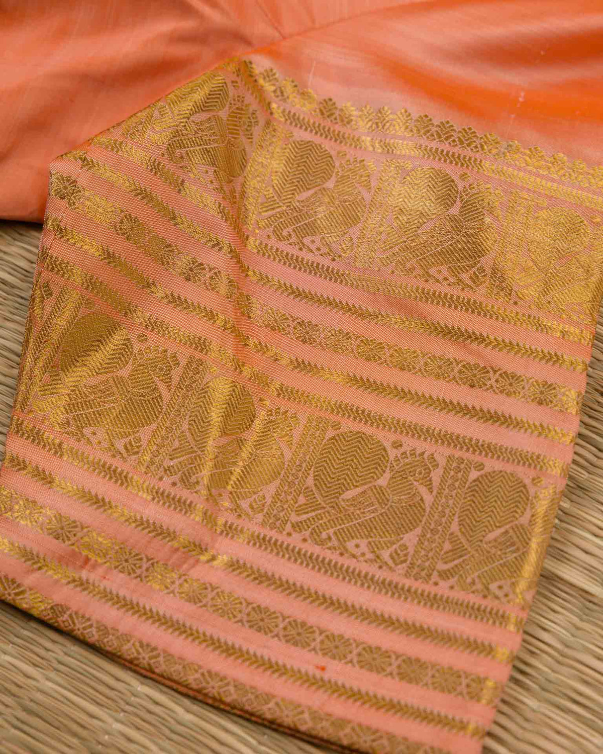 Pure kanjivaram in unique shade of peachish orange