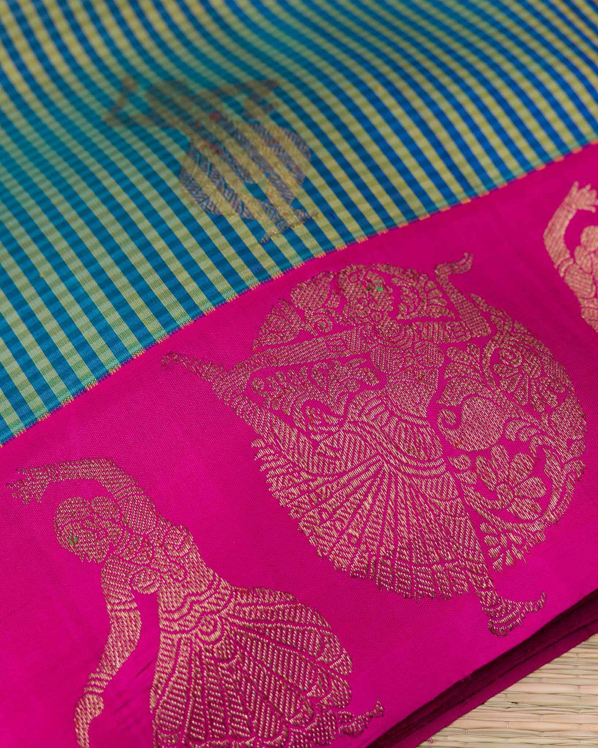 Peacock Blue & Rani Pink Dancing Motif 2gm Zari Kanjivaram