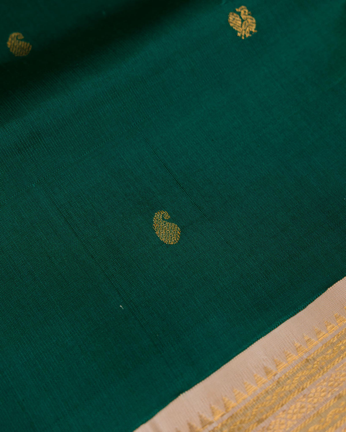 Emerald Green Koravai Kanjivaram with Pastel Border & Maggam Blouse