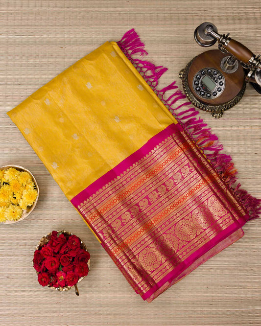 Yellow Tissue Gadwal with Rani Pink Pattu Border