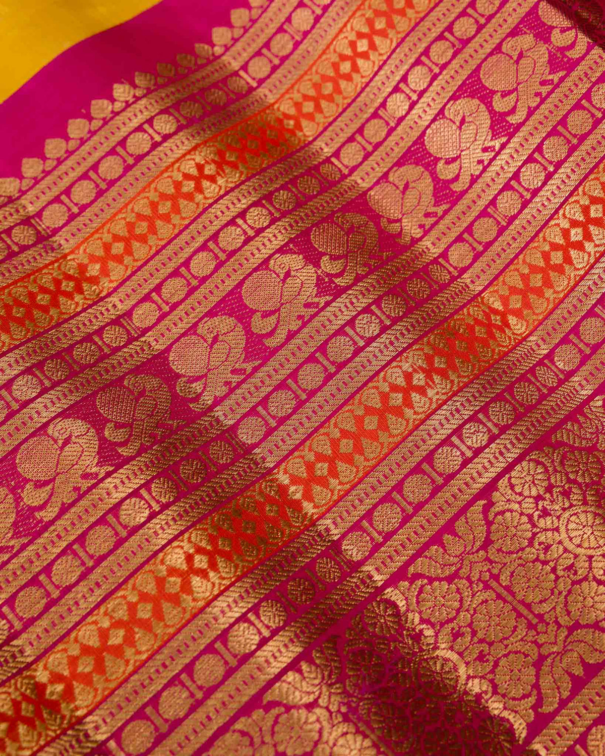 Yellow Tissue Gadwal with Rani Pink Pattu Border